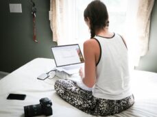 female student studying on laptop