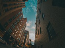 low-angle-photo-of-street-between-two-buildings